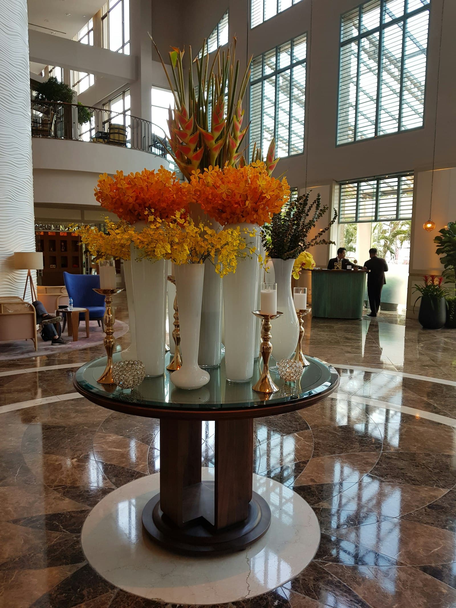 Bright welcoming facility lobby with fresh flowers and natural light